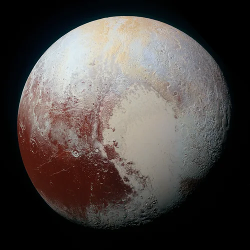 Pluto by NASA and the Space Telescope Science Institute
